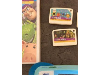Console jeux mobigo V tech + 3 jeux